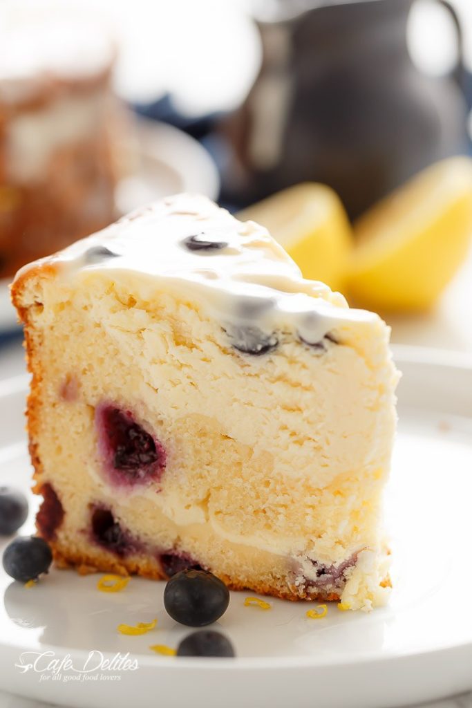 Blueberry Lemon Cheesecake Cake is a blueberry cake scented with a zesty lemon aroma underneath a creamy and fluffy cheesecake, baked in the one pan! The first of it’s kind!