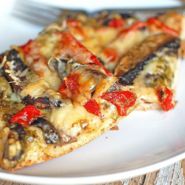 I honestly loved the taste and texture of these portobellos (gills and all) baked with roasted red peppers atop a punchy pesto crust. And of course, under a blanket of melted cheese.