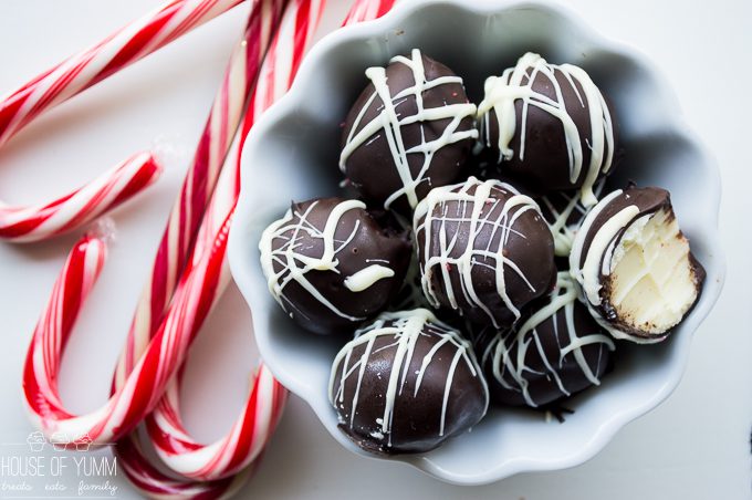 EASY 4 Ingredient Peppermint Truffles. Amazingly creamy peppermint white chocolate ganache center coated with MORE chocolate and drizzled with extra white chocolate. Perfect Christmas dessert!
