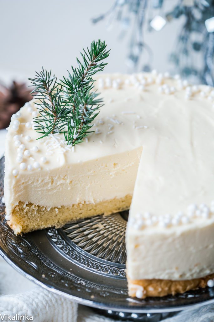 This White Christmas Truffle Cake is a beautiful holiday dessert that consists of a fluffy sponge layer and white chocolate truffle. Stunning in its simplicity!