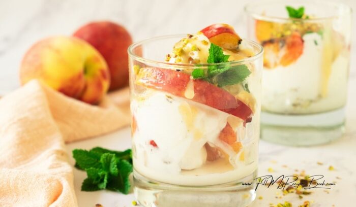 Easy caramelized grilled peaches and ice cream topped with homemade caramel. A fresh peach dessert that’s sweet, and perfect for a dessert.