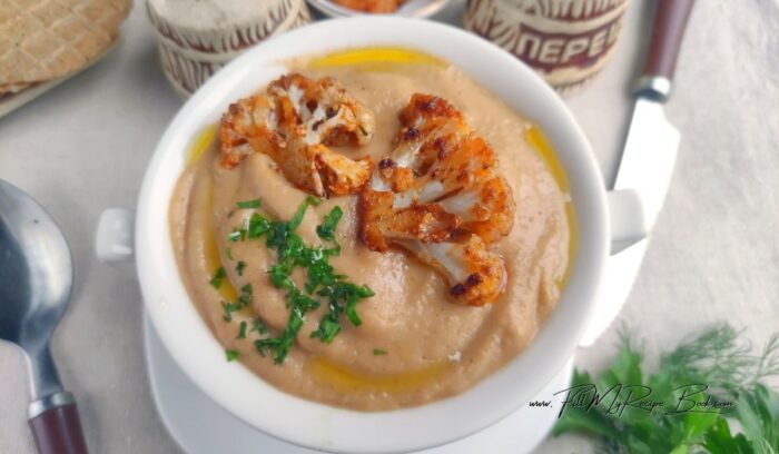 Flavorful Roasted Cauliflower Soup recipe, with simple ingredients made from scratch. Healthy, perfect for weeknight cozy dinners on cold days.  Complete the soup cooking on the  for a hot  or dinner for cold winter or fall days. Easy to warm up and serve. 