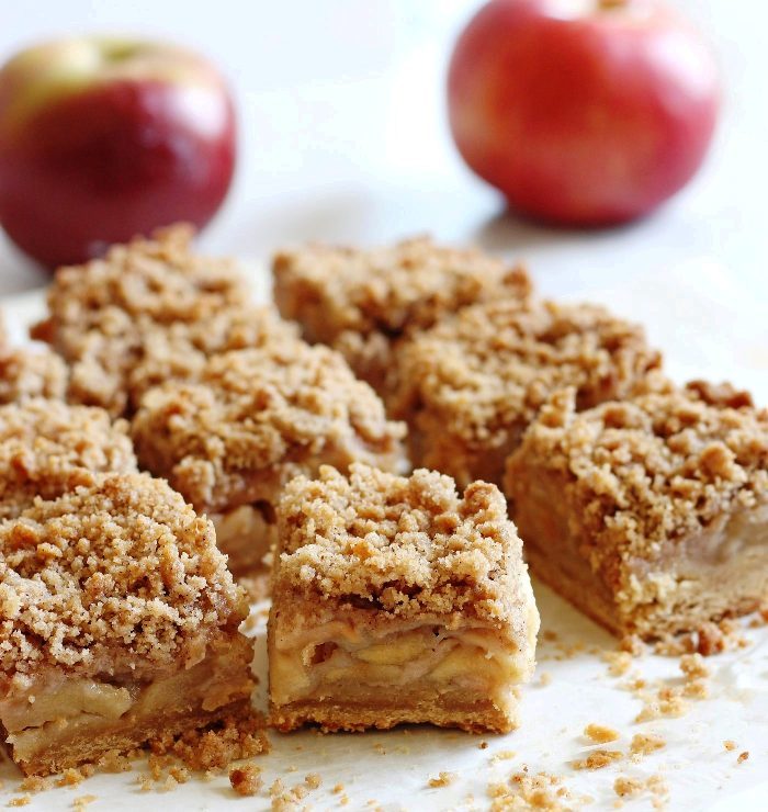 Apple Crisp Bars are easy to make from scratch. This recipe uses a basic shortbread crust topped with apple slices and a simple flavorful crisp.