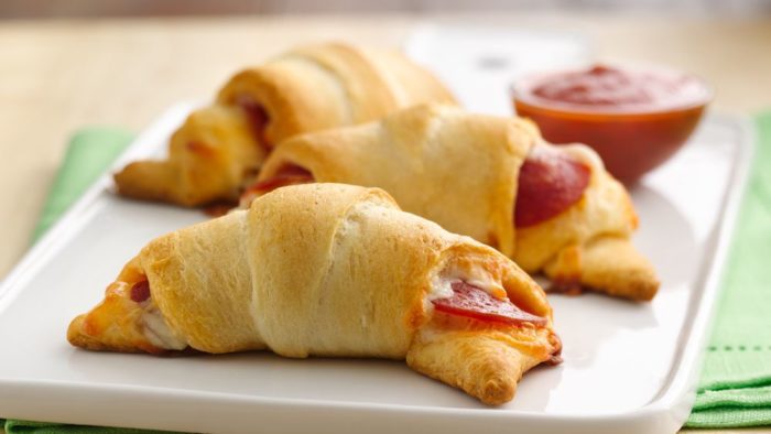 All you need for these four-ingredient Pepperoni Pizza Crescent Rolls is 30 minutes and a hankering for something cheesy, buttery, flaky and fun to make.