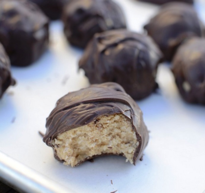 Easy no bake peanut butter balls coated in chocolate