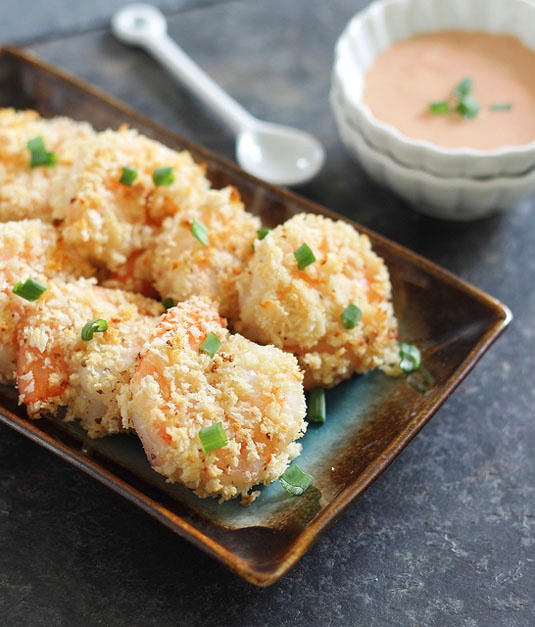 This baked bang bang shrimp is a healthier take on the famous restaurant version. it’s still crispy, crunchy and served with a killer sauce.