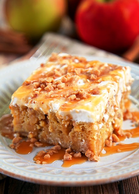 Caramel Apple Pie Poke Cake Recipe – apple cake soaked in caramel sauce topped with cool whip and toffee bits.
