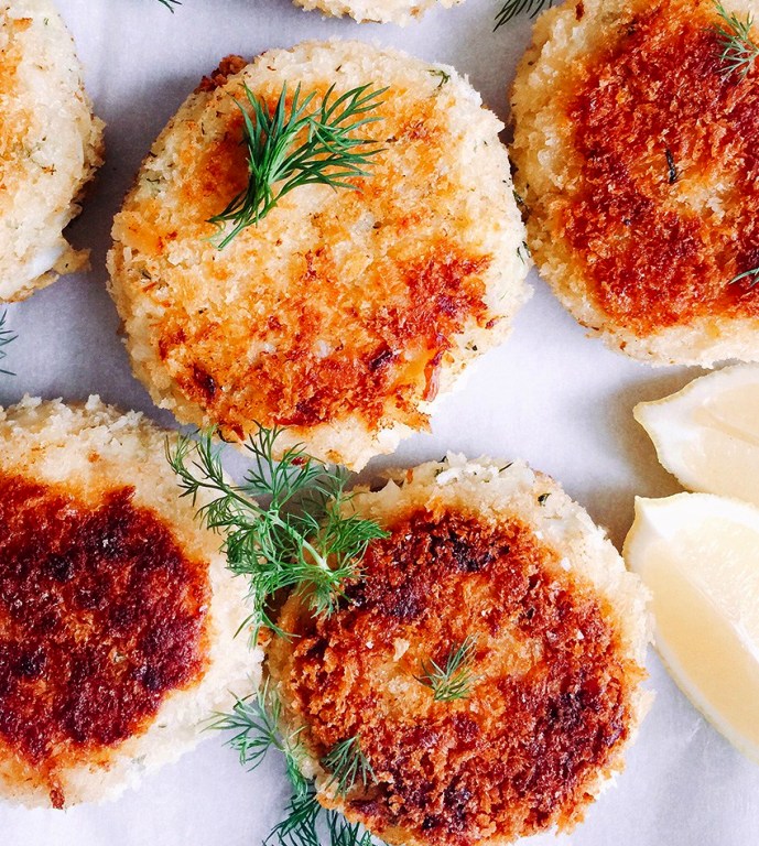 They are made with a classic flavour combo of potato and dill and make a healthy lunch or light dinner.  I roll the mixture into roughly 1/4 cup sized patties and pass them to my little guy to dip in the flour, egg and then finally the crumb mixture.  

