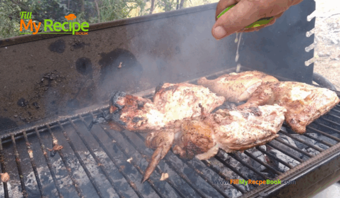 Juicy Grilled whole Lemon Chicken. Grilled on outside braai or barbecue this recipe of a spatchcock chicken seasoned with fresh lemon juice.
