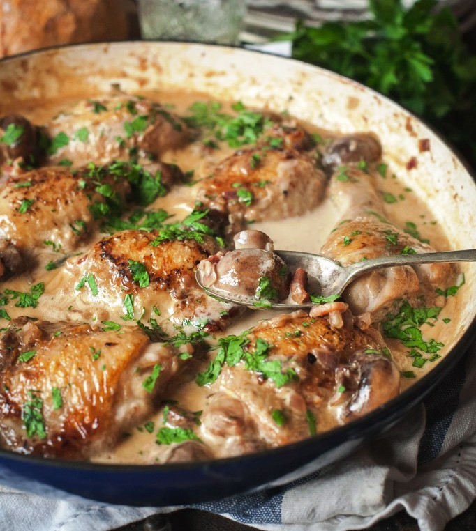 Succulent chicken with cremini mushrooms braised in white wine and a splash of cream. I present to you Coq au Vin Blanc.