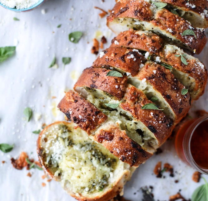 Cheesy pesto garlic bread.