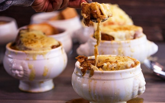 A French onion soup with roasted garlic croutons for a warm delicious lunch or dinner.