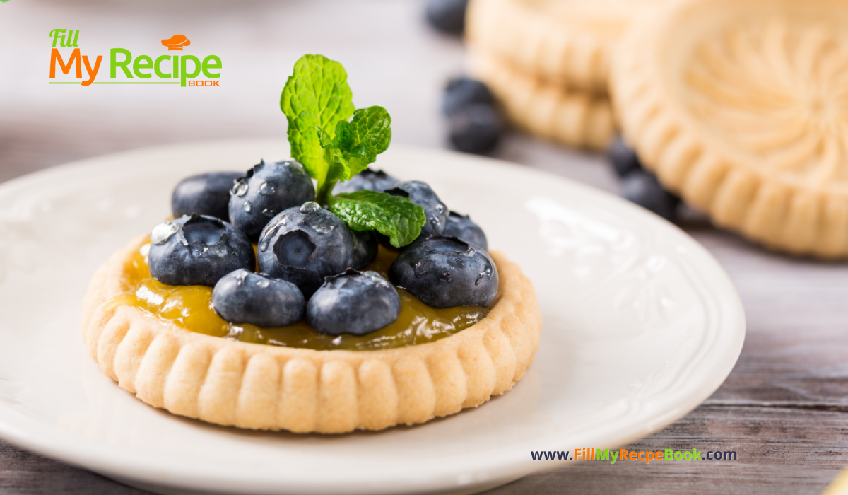 A mini Lemon Curd and Blueberry Tartlets Recipe. Oven baked dessert with shortbread crusts, filled with tangy lemon curd and blueberries.