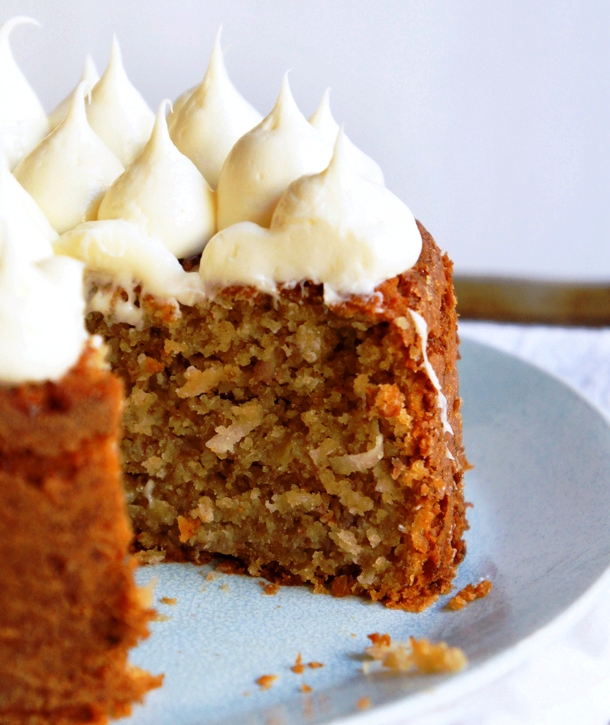 Fluffy banana cake with coconut and creamy honey frosting
