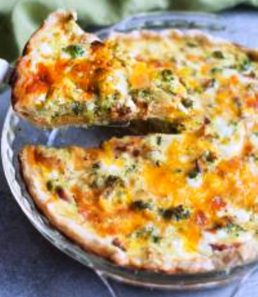 Easy Broccoli Cheese Quiche made in my favorite homemade pie crust. Family and friends alike love this easy brunch recipe!