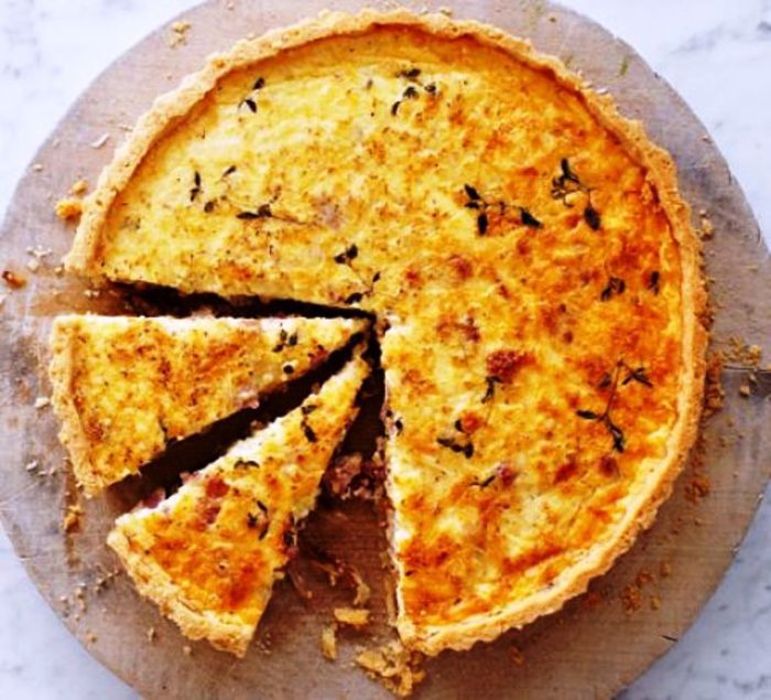 Make quiche Lorraine to perfection every time with this easy recipe for a crisp pastry base and rich smoked bacon, cheese and thyme filling