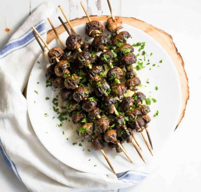 Grilled mushrooms with herbed brown butter sauce