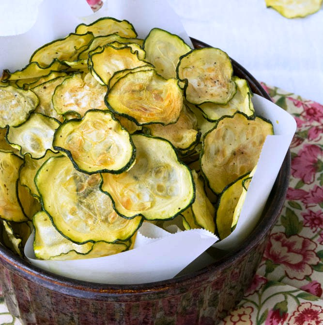 These Easy Crispy Salt and Vinegar Zucchini Chips are gluten free, grain free, keto and low carb too! You can make them in a dehydrator, oven or air fryer.