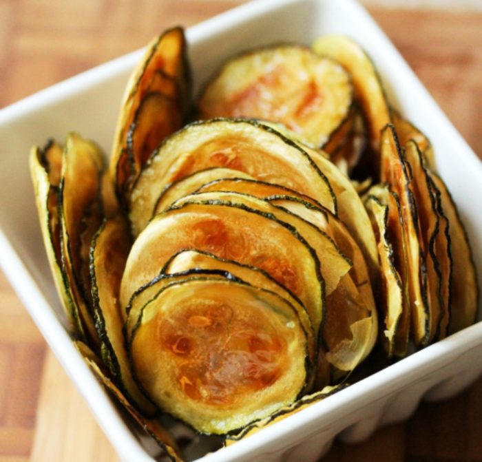 These easy oven-baked zucchini chips are thin, crispy, and perfect for pairing with all your favorite dips.