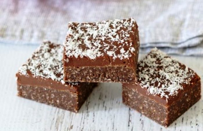 The most delicious two layer Chocolate Coconut Slice recipe ever! The perfect melt & mix recipe that takes just 10 minutes to prepare!