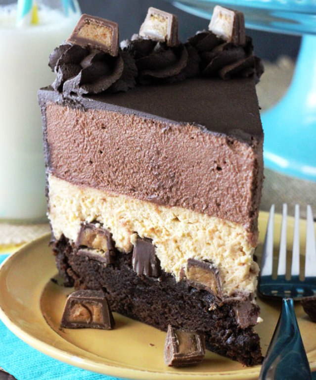 This Peanut Butter Chocolate Mousse Cake starts with a layer of brownie topped with mini Reese’s, then topped with a layer of peanut butter mousse, then a layer of chocolate mousse. It is rich, delicious, and yet light because of the mousse. Absolutely to die for!