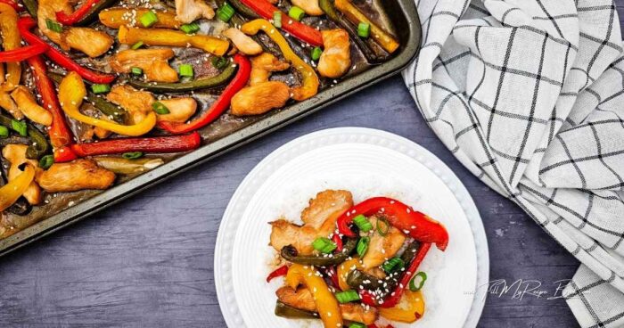 Family Favorite Teriyaki Chicken Sheet Pan Dinner with juicy chicken, colorful peppers, and a sweet savory glaze. A quick, an easy weeknight meal.
