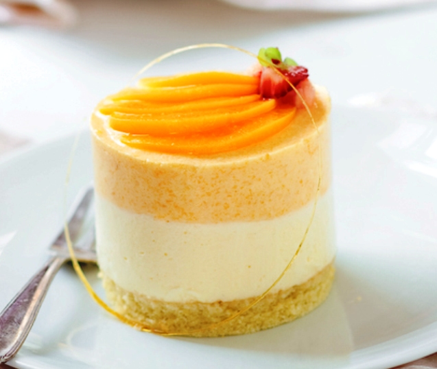 When crap hits the fan outside of my comprehension I just try to deal with it the best way I can: doing the things I know, doing them with dedication and focus. Yes, like twirling caramel strands around Peach and Chamomille Mousse Cakes.
