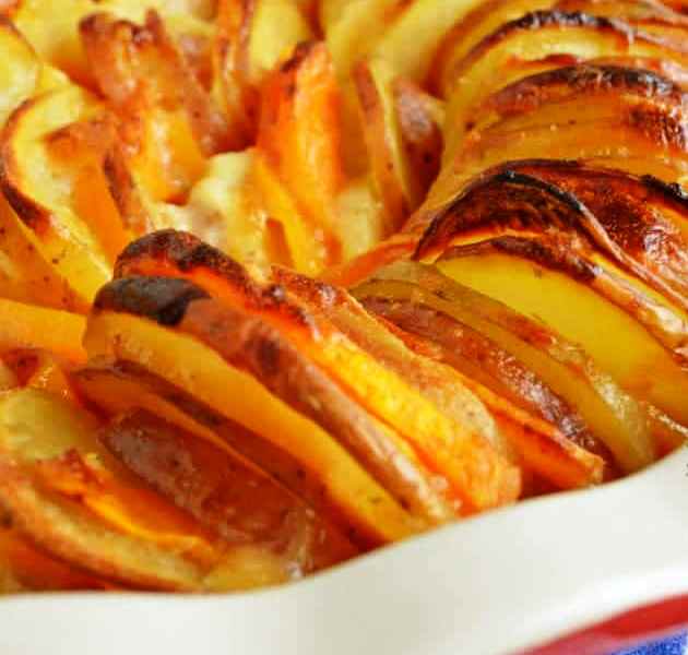 Garlic Herb Potatoes and Squash are a great addition to the Thanksgiving Table! Cheesy, buttery, tender, delicious.