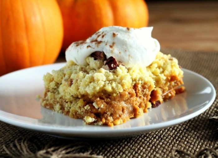 This Pumpkin Crunch Cake tastes like a pumpkin pie with a crunchy pecan streusel layer on top.