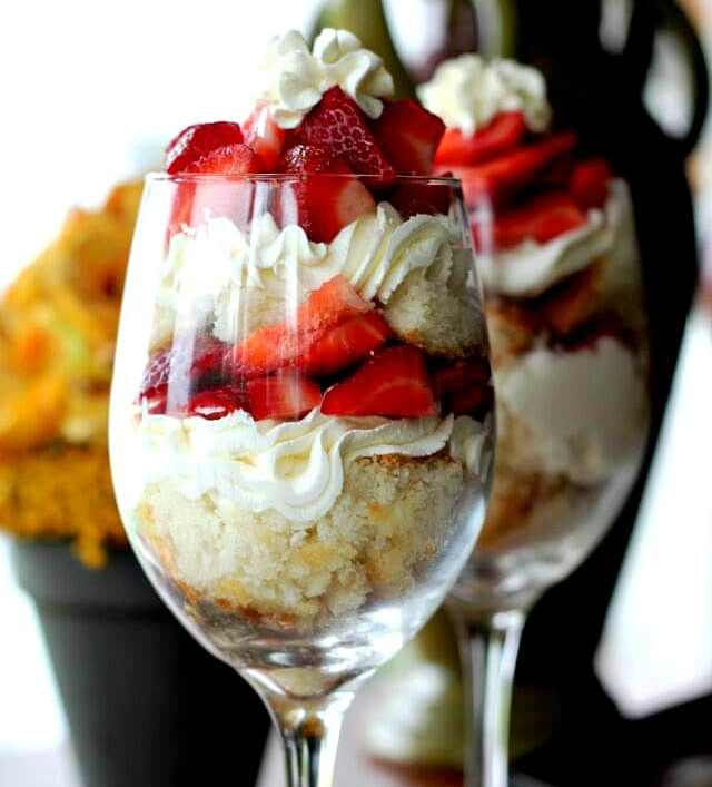 Strawberry Explosion Cheesecake Trifle Desserts are layers of fluffy, dreamy clouds of cheesecake whipped cream, fresh, ripened, juicy strawberries and fluffy white cake boasts an elegant dessert, that's a sure show-stopper for summer-time.