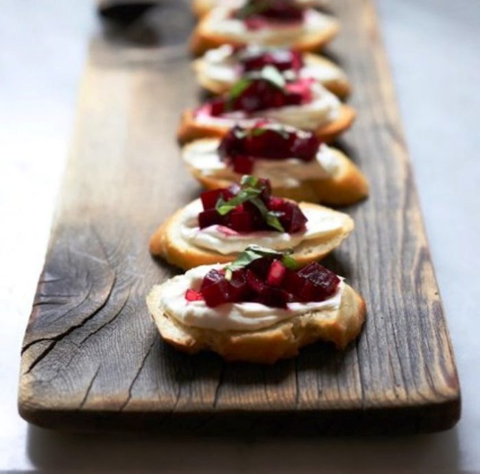 Beet bruschetta with goat cheese and basil
