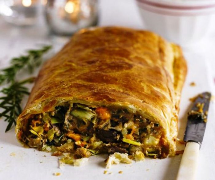 This vegetarian main course is packed with festive flavours and wrapped in flaky butter puff pastry - a real Christmas treat.