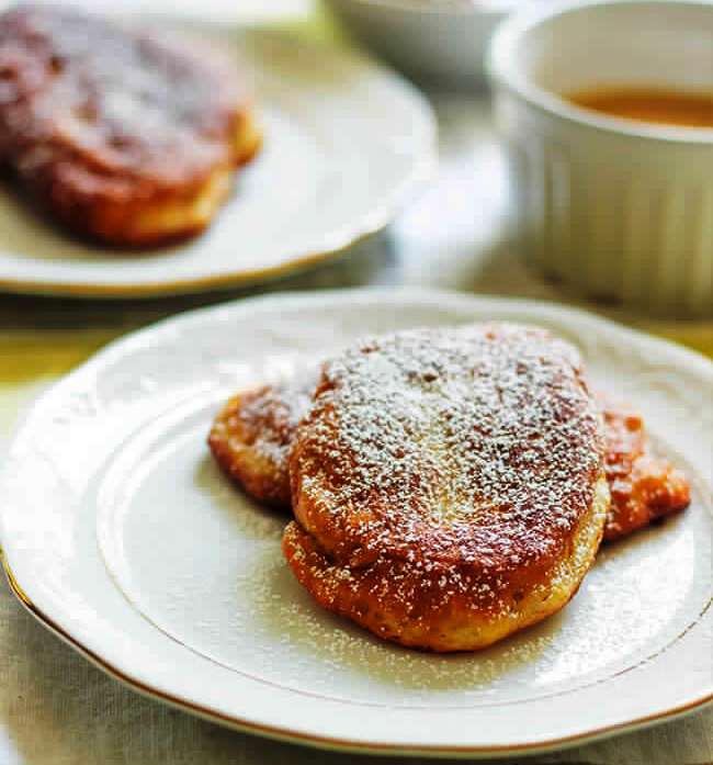 Super easy Jamaican banana fritters are light, fluffy and soooooo tasty. It is a cross between a donut and mini pancakes.