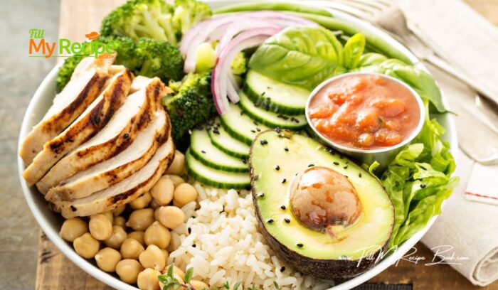 Simply healthy delicious Grilled Chicken Rice Lunch Bowl with chickpeas, broccoli and salad recipe. Easy idea for a weeknight meals, lunch.