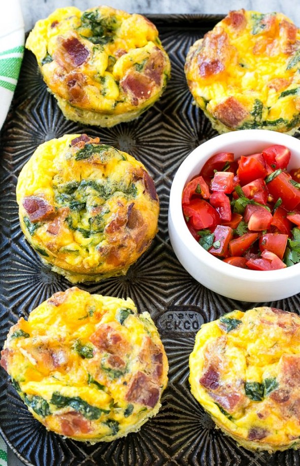 Breakfast egg muffins with bacon, cheddar and spinach