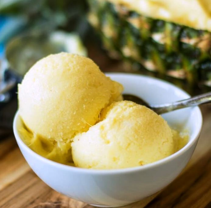 A creamy and sweet pineapple frozen yogurt made from fresh pineapple will soon become your new healthy indulgence!