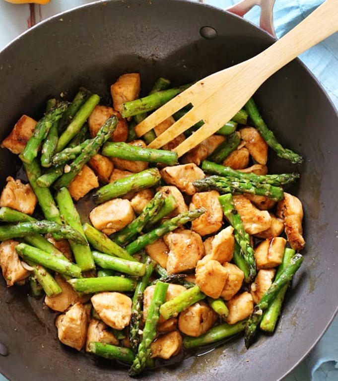 This quick weeknight Chicken and Asparagus Lemon Stir Fry is perfect for spring, made with lean chicken breast, asparagus, fresh lemon, garlic and ginger.