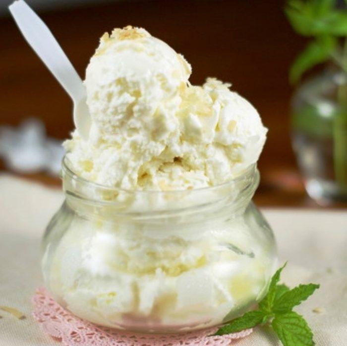 Amazingly delicious homemade creamy coconut ice cream, with just three simple ingredients and no machine needed!