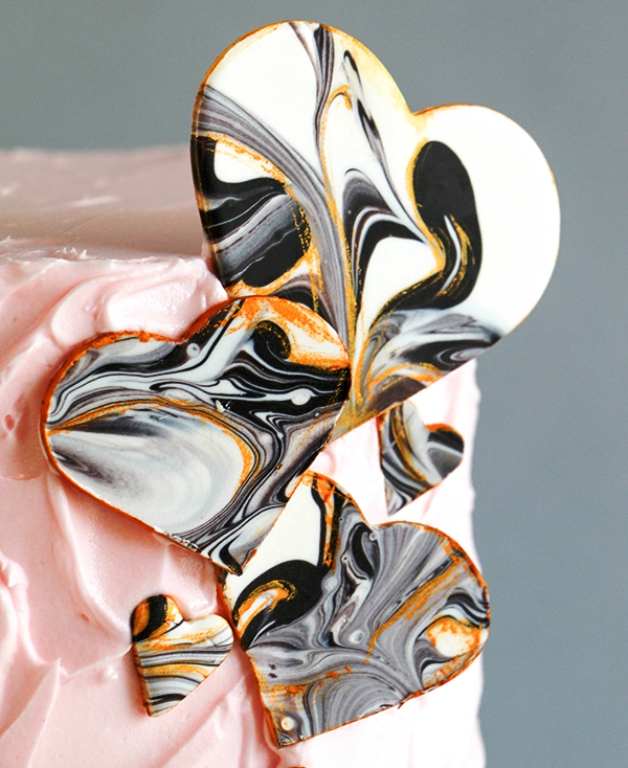 Marble Chocolate Hearts – how to make marbled heart toppers for cakes and cupcakes using chocolate coating and cookie cutters.