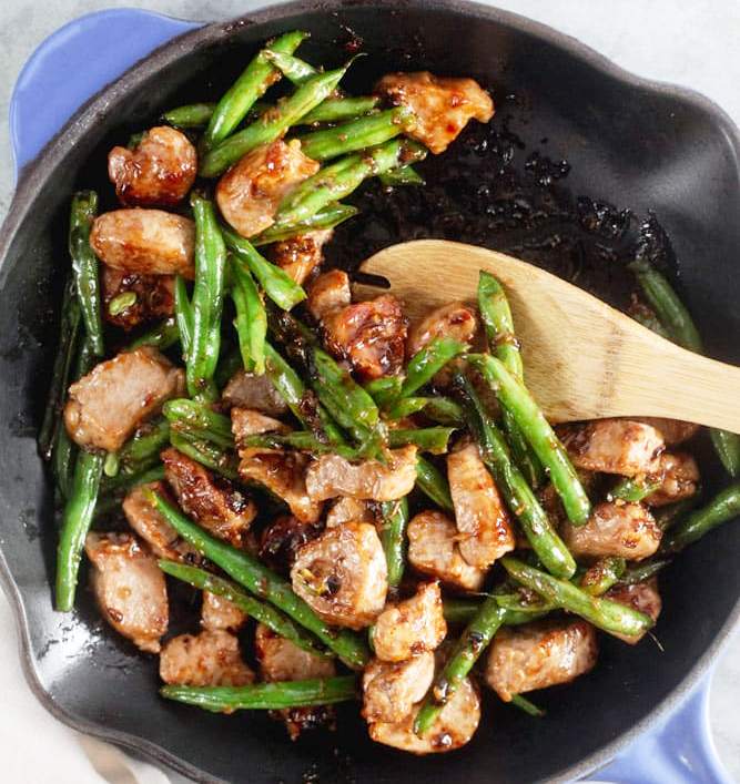 Stir fried pork in sticky, sweet honey-ginger sauce