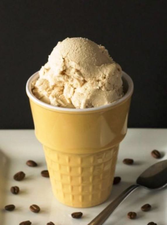 This is a low-carb and sugar-free homemade coffee ice cream without eggs in the recipe. It's a creamy high fat ice cream that scoops well after freezing.