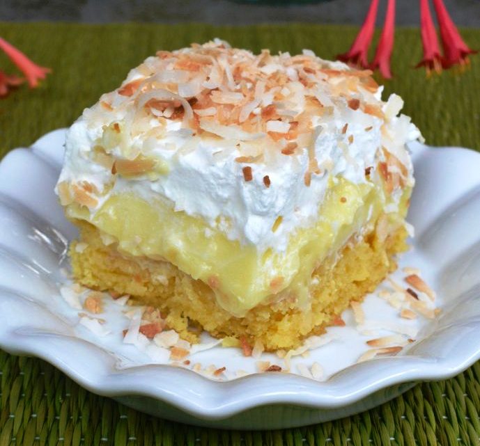 Luscious cake with pineapple and coconut, topped with fresh whipped cream and toasted coconut flakes is what dreams are made of. Pineapple Coconut Poke Cake is packed with fresh summertime flavors and is a short-cut recipe made from a box mix. 