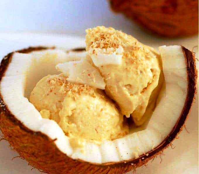 This perfect rich, sugar-free keto coconut ice cream recipe is made with only a few simple ingredients. This coconut milk treat is such a refreshing and wonderful dessert in the summer. You don't even need an ice cream maker!
