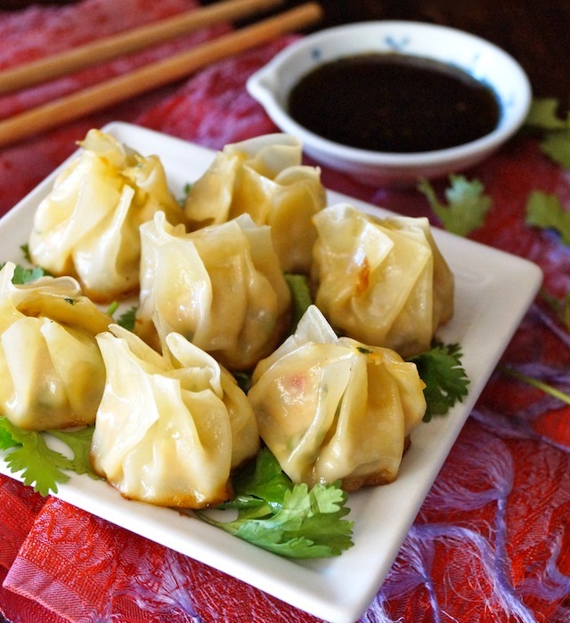 Ginger Chicken Dumplings are packed with juicy chicken, tender vegetables, garlic and ginger. Also referred to as Nepalese Momo, and quite similar to Chinese chicken dumplings, they're the perfect hors d'oeuvre or appetizer that you won't be able to stop eating!