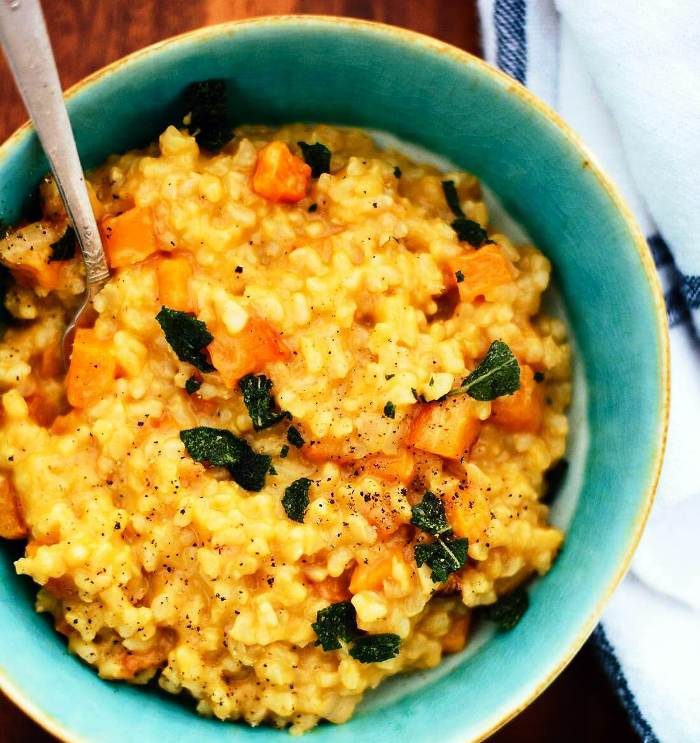 This butternut risotto recipe is comforting, yet redeeming, and absolutely delicious. It features tender, caramelized cubes of butternut squash throughout.
