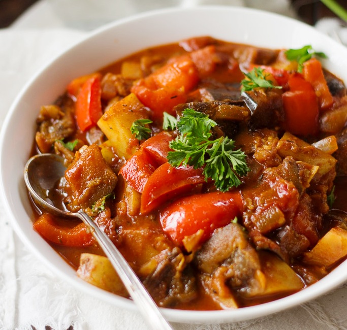 Potatoes, bell peppers and tender-melt-in-your-mouth chunks of eggplant are simmered up in a smoky paprika sauce to make this hearty and comforting vegan goulash.
