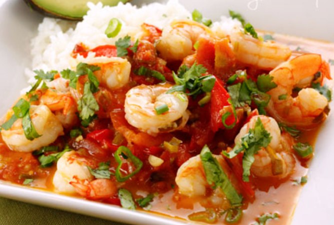 garlic shrimp in coconut milk, tomatoes and cilantro