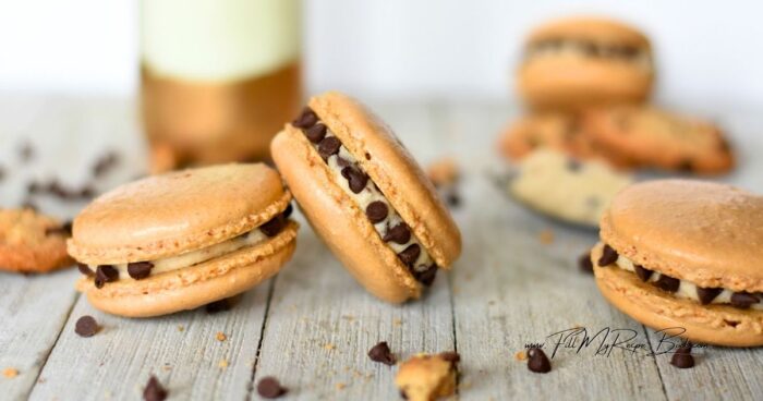 Chocolate Chip Buttercream Macarons are delicate French sandwich cookies with crisp shells, chewy centers, and a smooth, creamy filling.