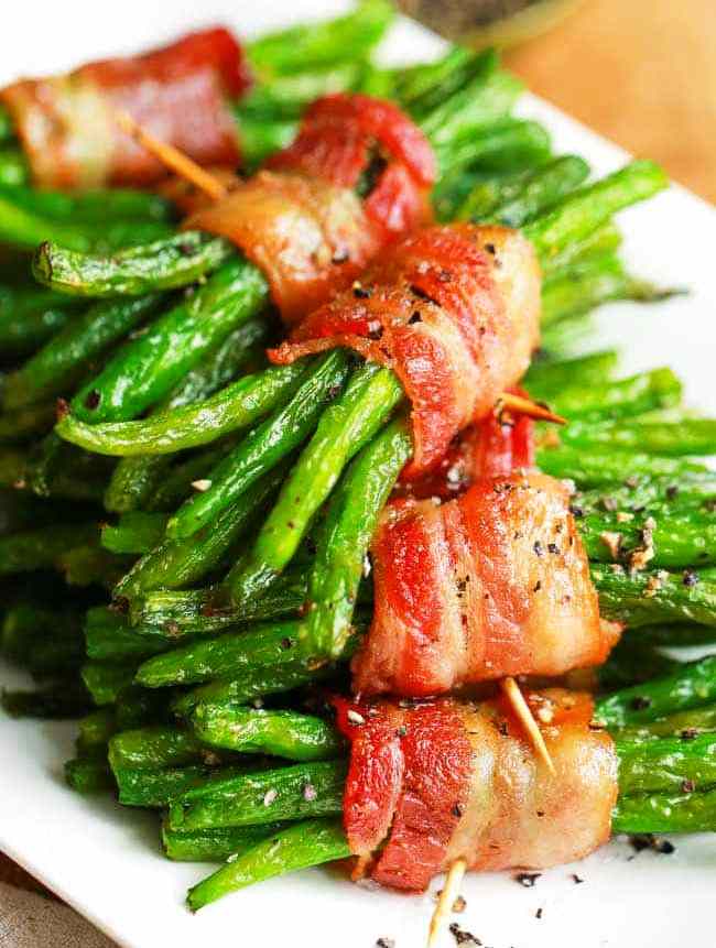 Bacon Wrapped Green Beans are easy enough for a weeknight meal and pretty enough to prepare for guests!