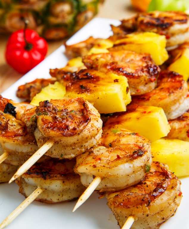 Spicy grilled jerk marinated shrimp and sweet and juicy pineapple skewers! Jamaican jerk spice comes in the form of a spice blend a paste or a marinade and its main ingredients are allspice, scotch bonnet peppers, green onions, thyme, nutmeg and garlic.